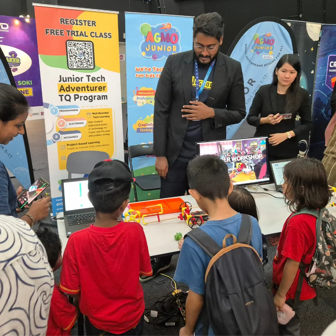 Visitors at the Agmo Junior Tech Adventurer Program booth