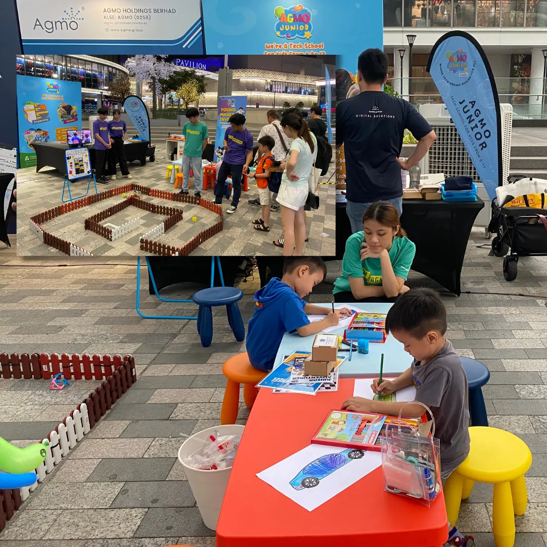 Children and trainers building and testing robots in a classroom