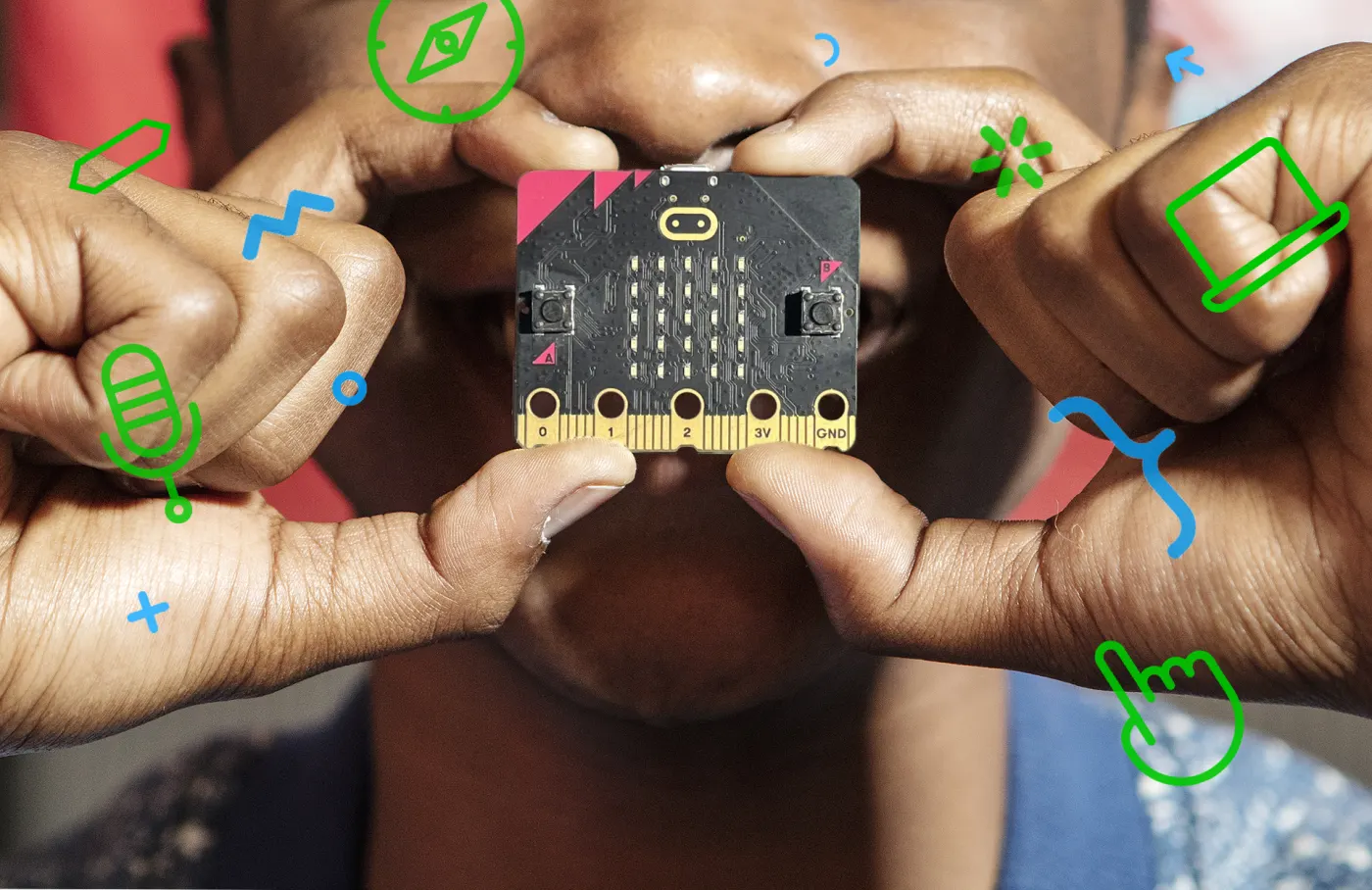 Kid showing of Micro:bit.
