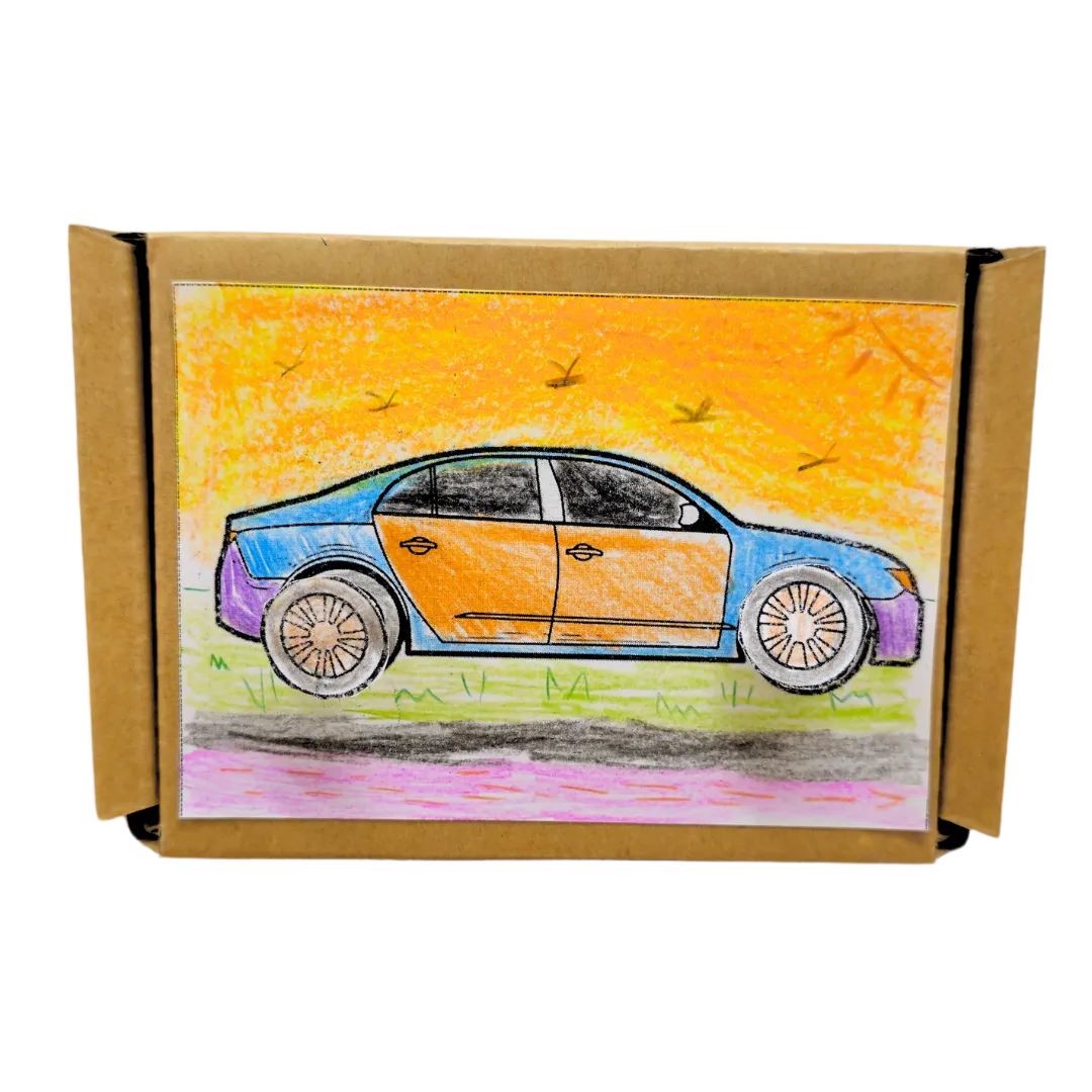 Power Wheel DIY Kit box with a coloured car design in blue and orange